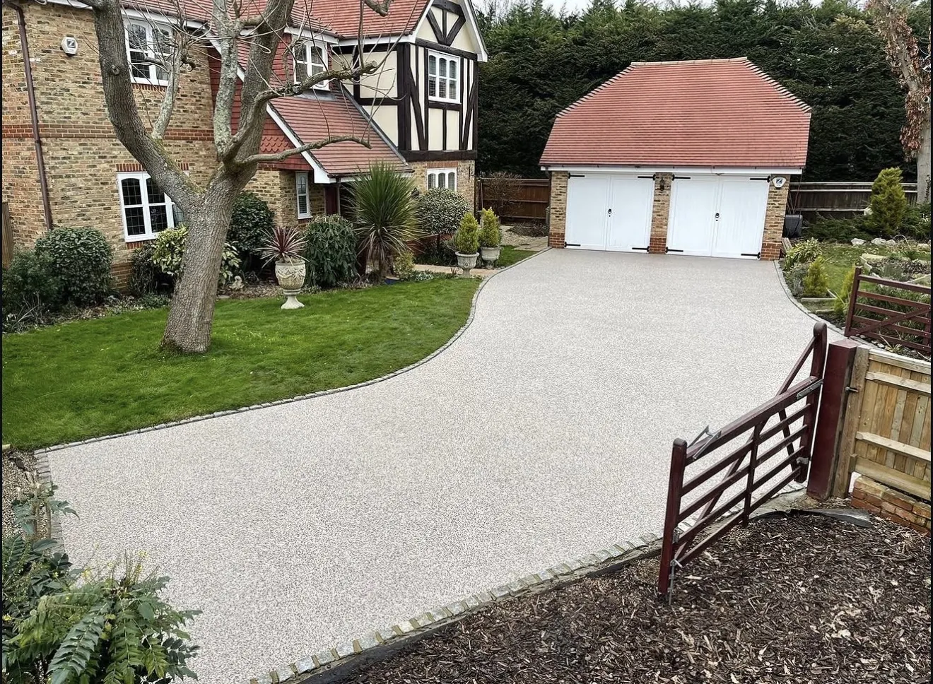 Detached Tudor-Style House resin bound driveway by SureLay UK in Calcot , Berkshire