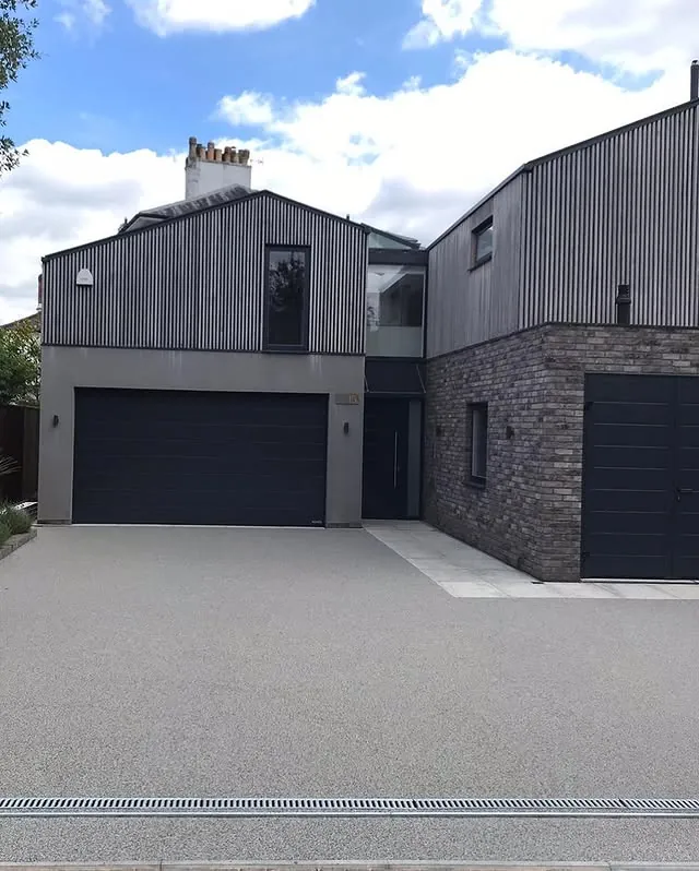 Contemporary New Build resin bound driveway by SureLay UK in Reigate, Surrey