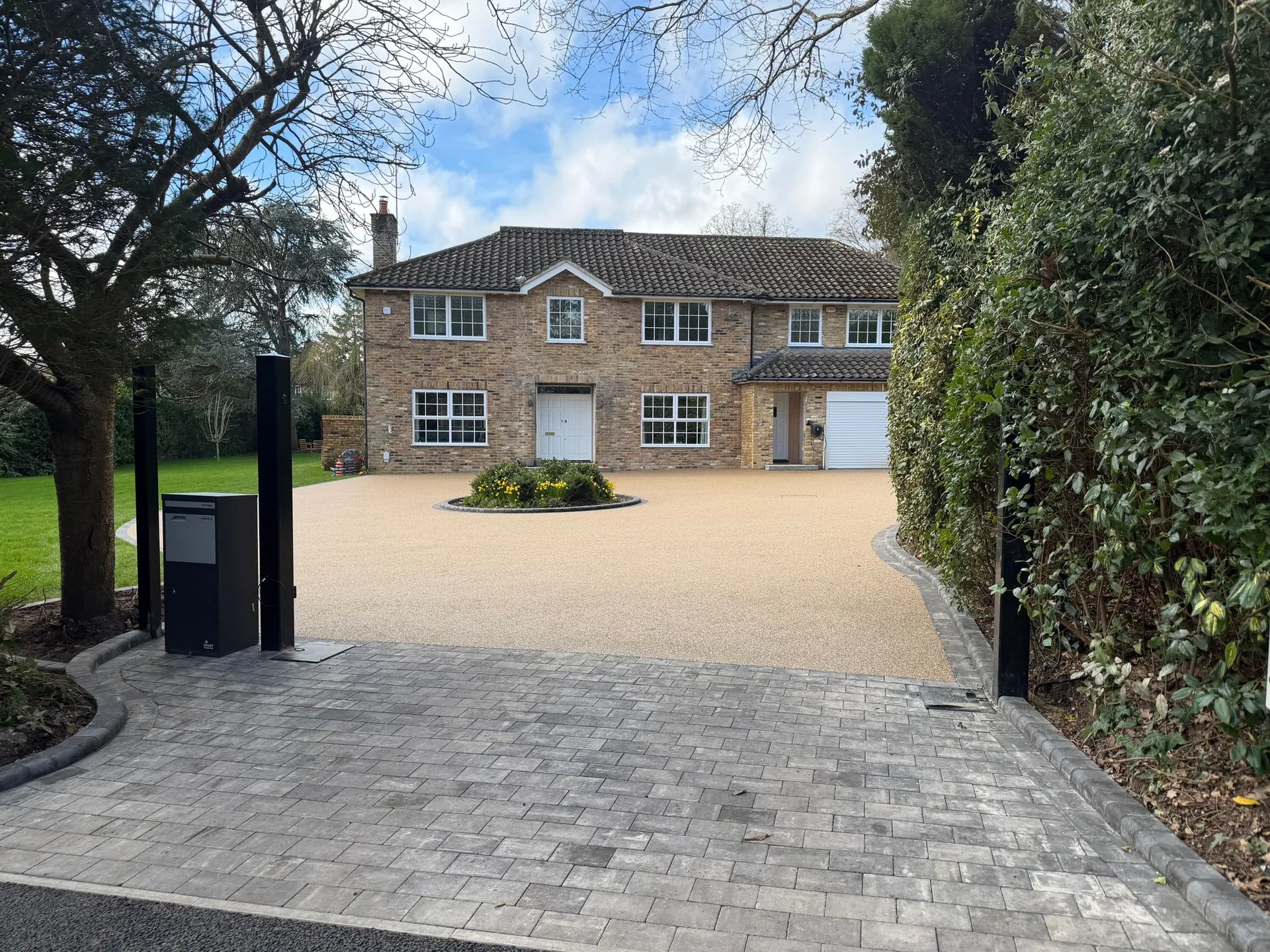 Gated Stone-Built Detached Property resin bound driveway by SureLay UK in Sunningdale, Berkshire